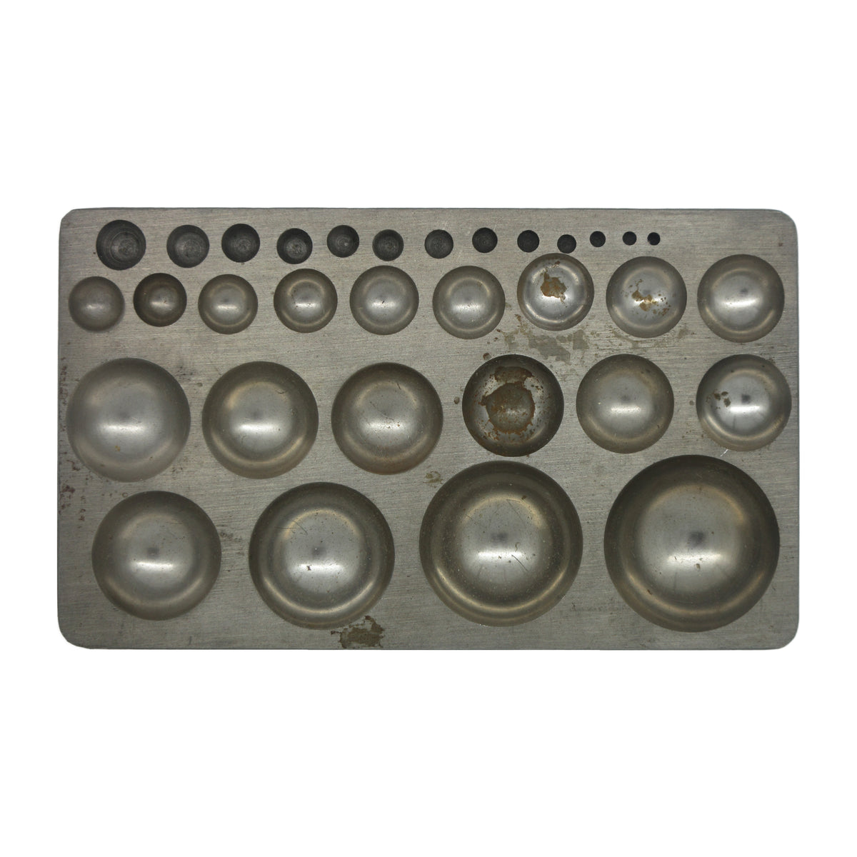 Metal dapping block with graduated round depressions for jewelry making