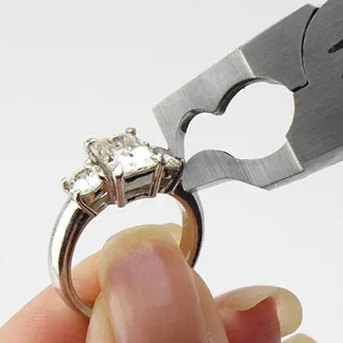 Goldsmith stone removal plier tool close-up