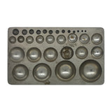 Metal dapping block with graduated round depressions for jewelry making