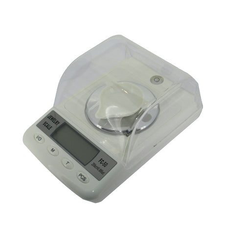 Digital gemstone scale measuring diamonds in carats