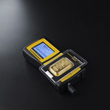 GoldScreenSensor testing gold bullion through protective capsules and sealed packaging