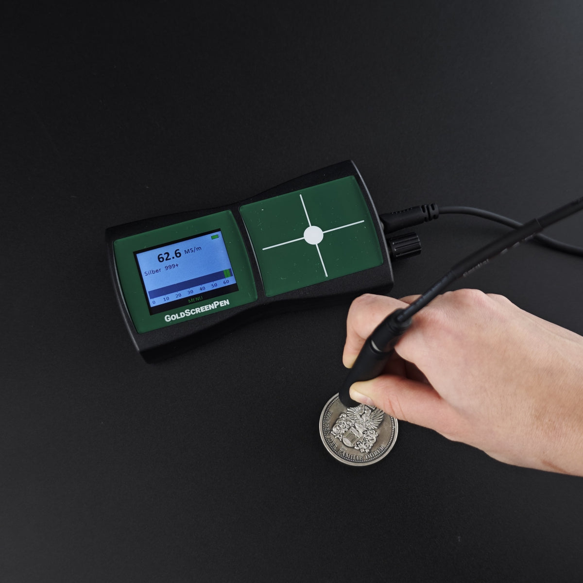 Gold tester detecting tungsten counterfeit coins