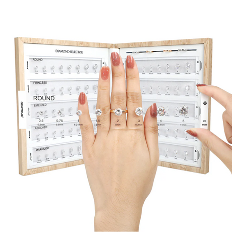 diamond comparison kit with multiple carat sizes and shapes