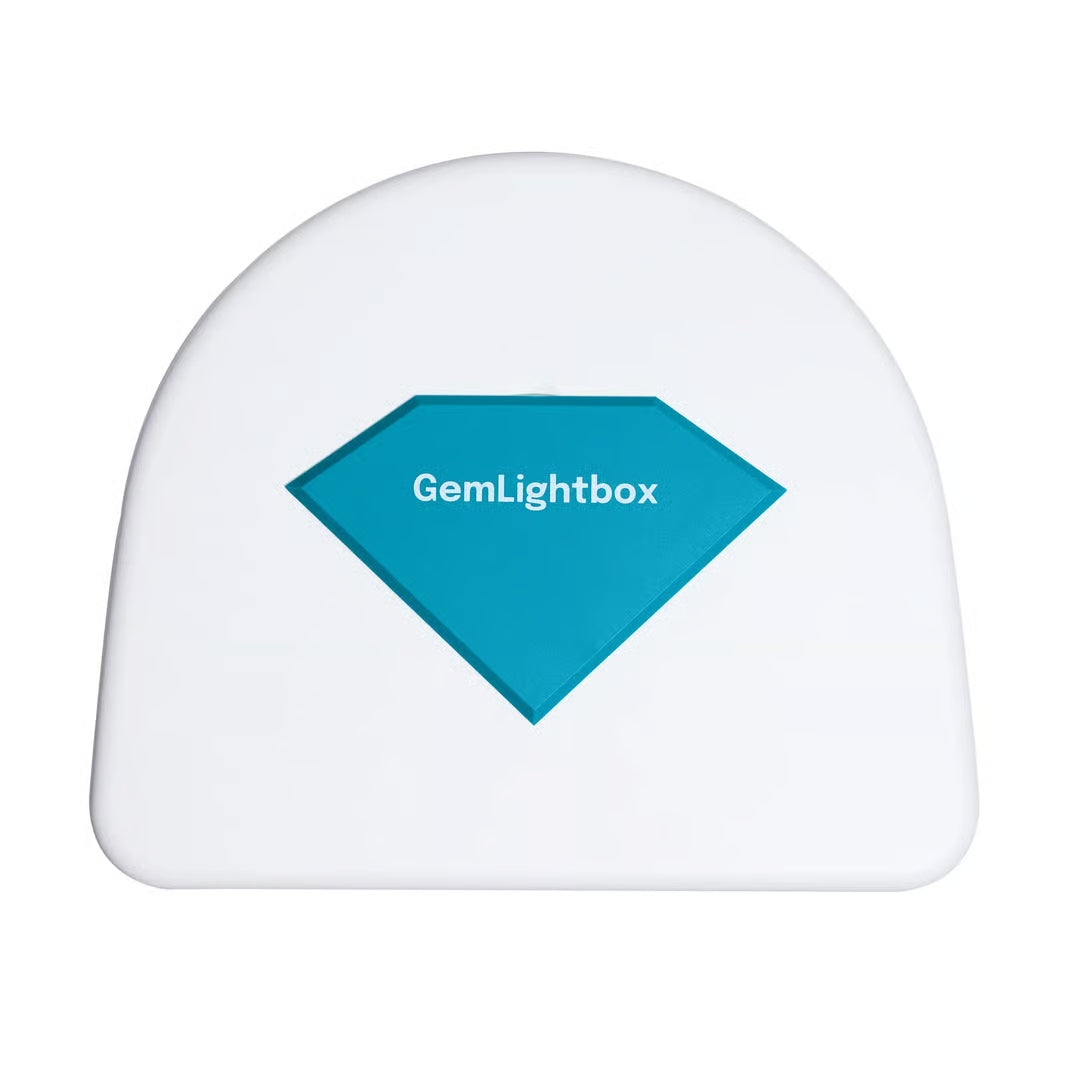 GemLightbox Pro smartphone jewelry photography lightbox with dual turntables for rings, necklaces, earrings, and gemstones top view
